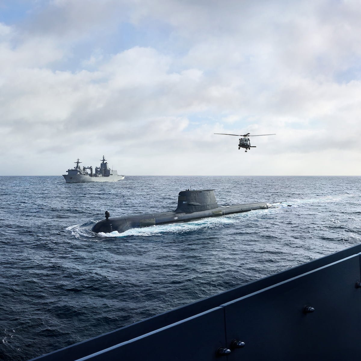 Submarine, surface ship and helicopter travel as one.