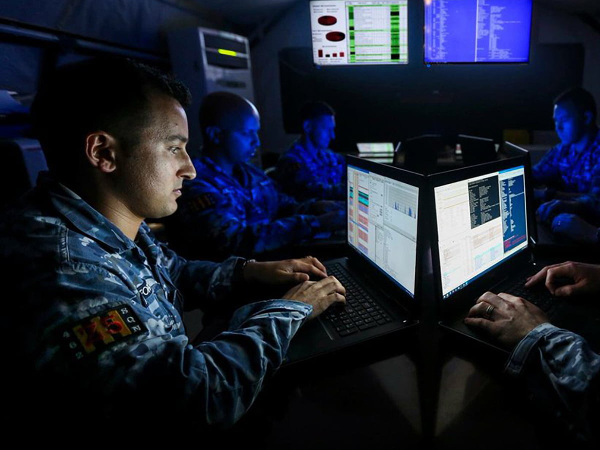 A member of the AIr Forces monitors data on a computer screen.
