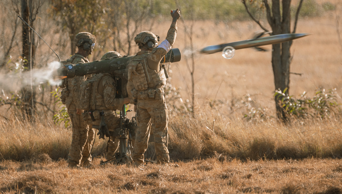Army personnel launch missiles in the outback.