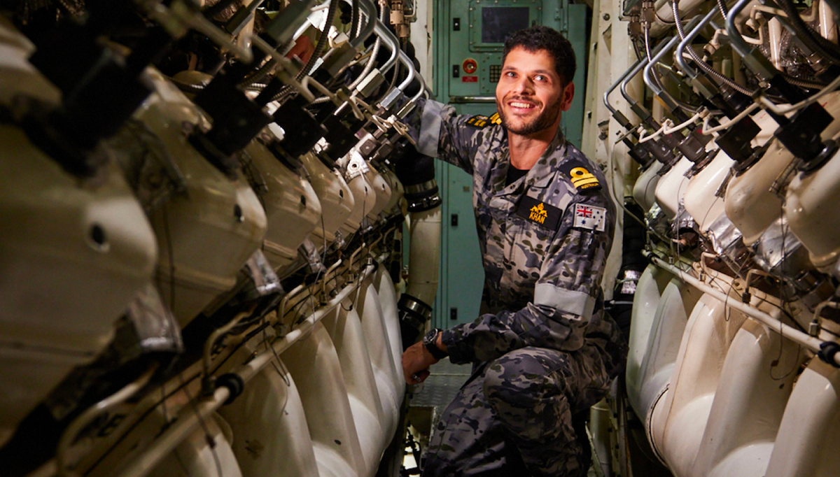A member of the NAvy ensures equipment is up to standard.
